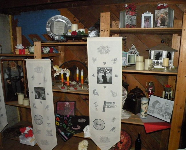 shelves with batb convention memorabilia