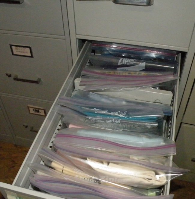 open file drawers showing memorabilia